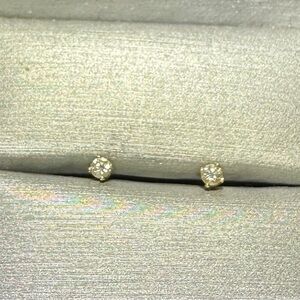 1/8 carat each, tiny diamond screw backs, set in 14k Gold